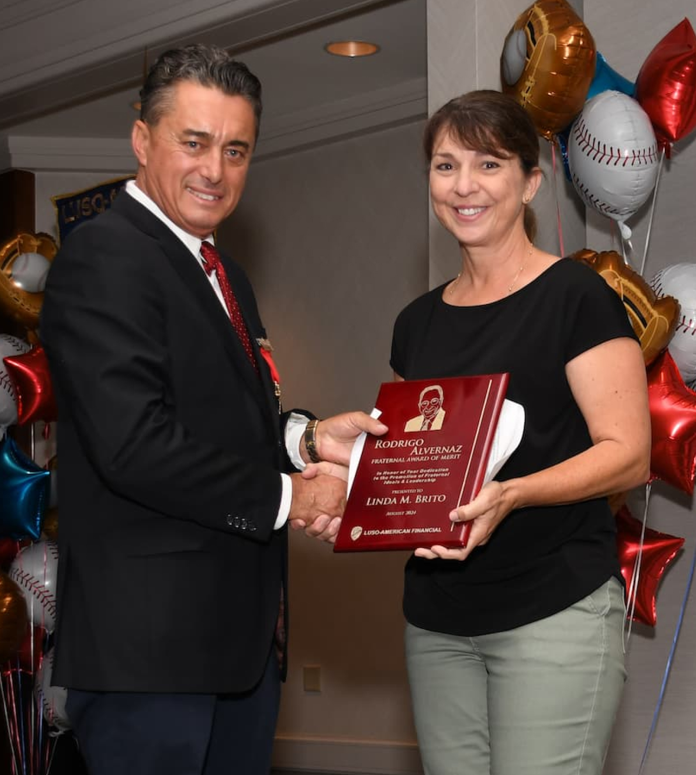 Fraternal Annual Awards Man And Woman Handshake